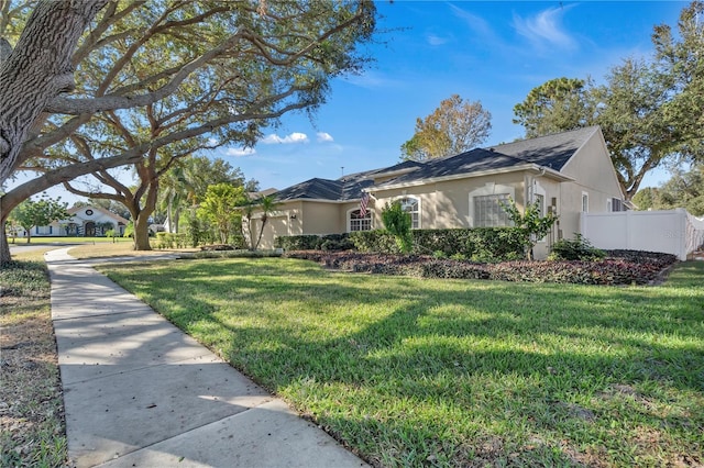 view of front of house with a front lawn