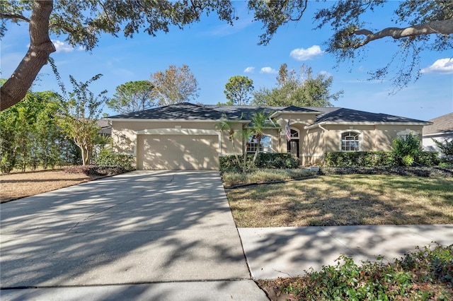 ranch-style house featuring a garage