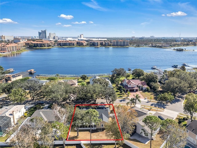 birds eye view of property featuring a water view