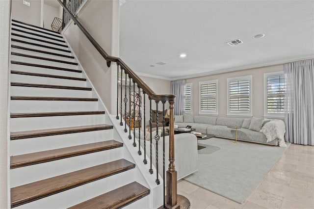 interior space with crown molding