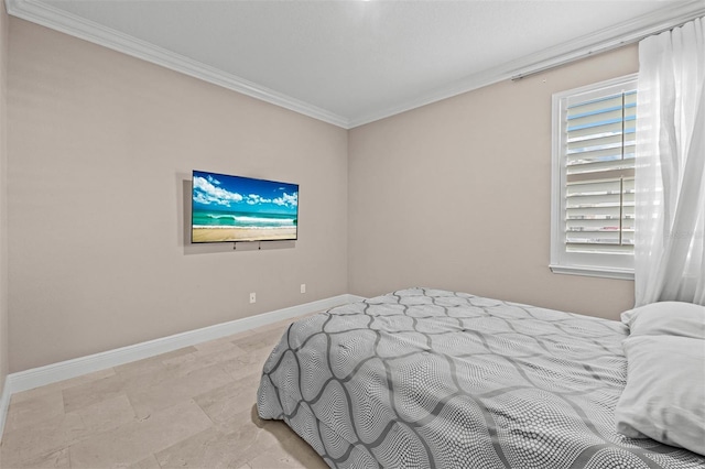 bedroom featuring crown molding