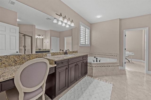 bathroom with tile patterned flooring, vanity, and plus walk in shower