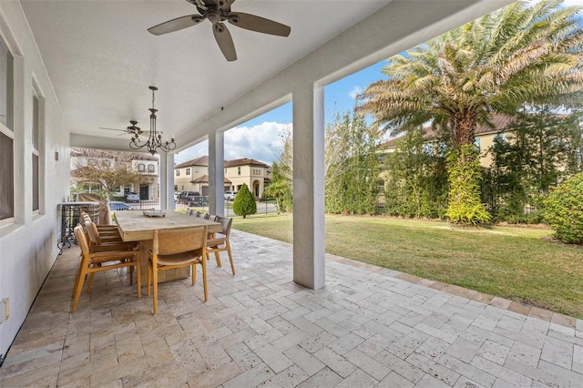 view of patio / terrace featuring ceiling fan