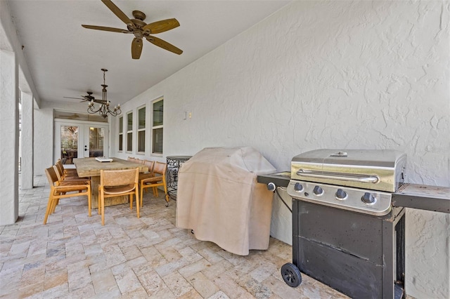 view of patio with ceiling fan, a grill, and french doors