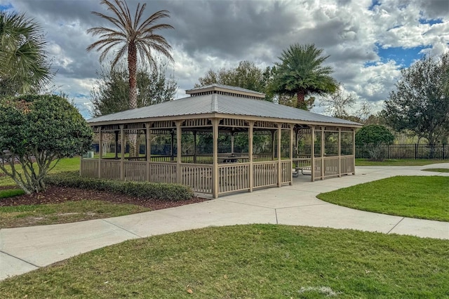 view of home's community with a gazebo and a yard