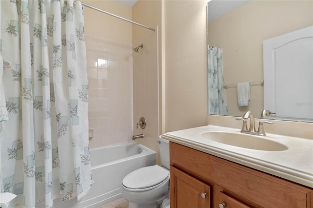 full bathroom featuring vanity, toilet, and shower / bath combo with shower curtain