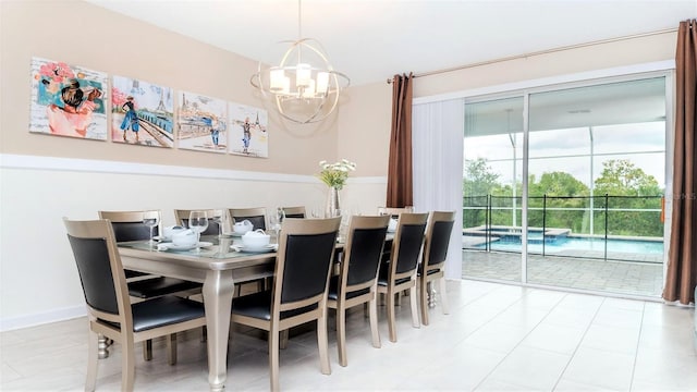 dining space with a chandelier