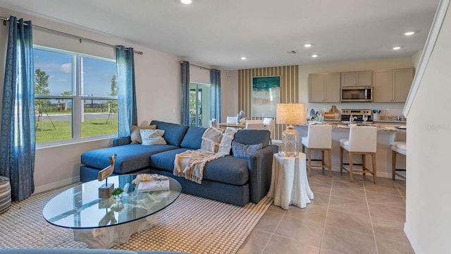 living room featuring light tile patterned floors