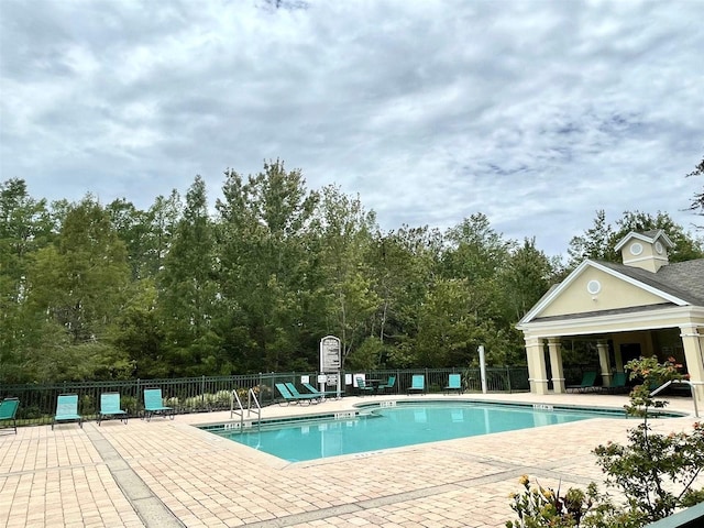 view of pool with a patio area