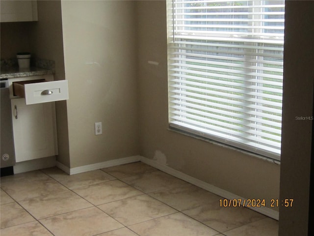 interior space with light tile patterned flooring