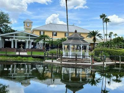 view of property's community featuring a gazebo and a water view