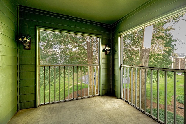 unfurnished sunroom featuring a healthy amount of sunlight