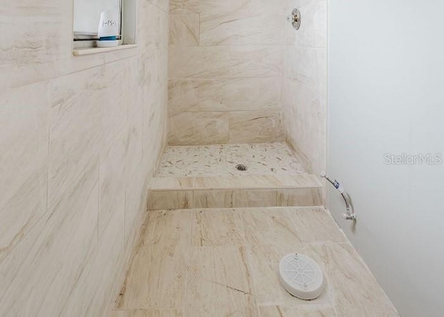 full bath featuring a stall shower