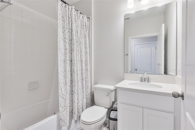 full bathroom with vanity, toilet, and shower / tub combo with curtain