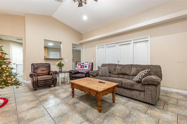 tiled living room with lofted ceiling