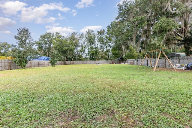 view of yard with a playground