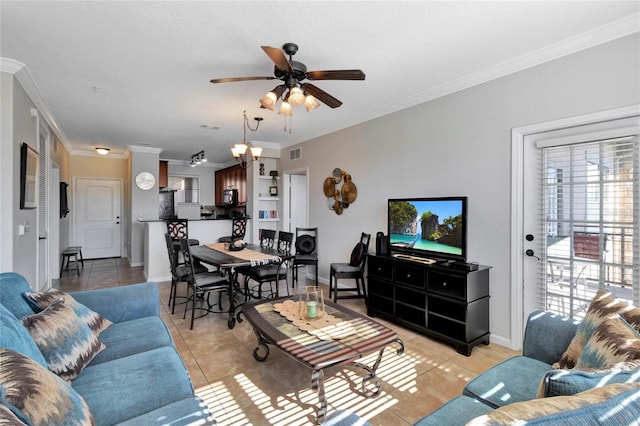 tiled living room with ceiling fan and ornamental molding