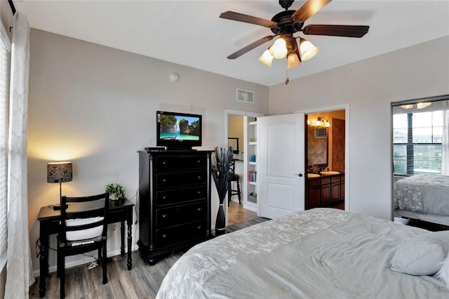 bedroom featuring ensuite bathroom, ceiling fan, and light hardwood / wood-style floors