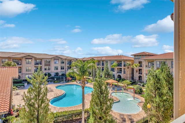 view of swimming pool with a patio