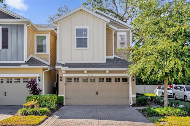 view of front of property with a garage