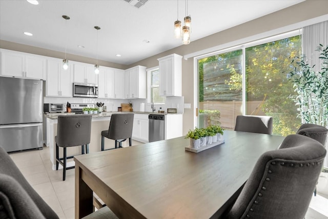 view of tiled dining space