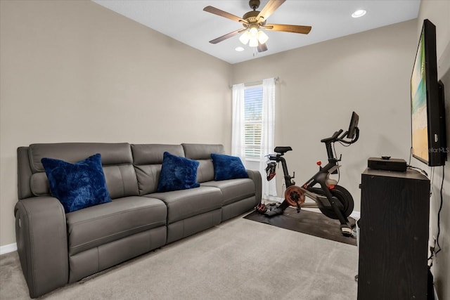 workout room featuring ceiling fan and carpet floors