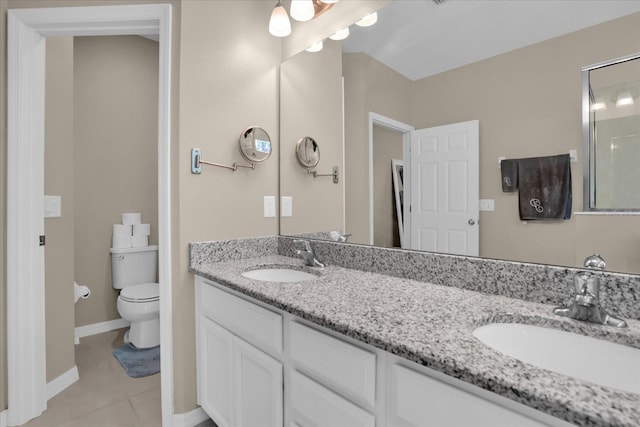 bathroom with walk in shower, tile patterned flooring, vanity, and toilet