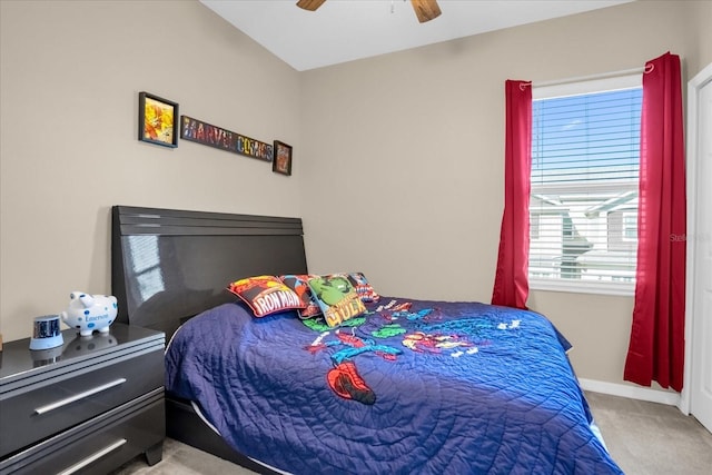 carpeted bedroom featuring ceiling fan