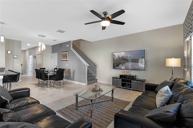 living room featuring ceiling fan