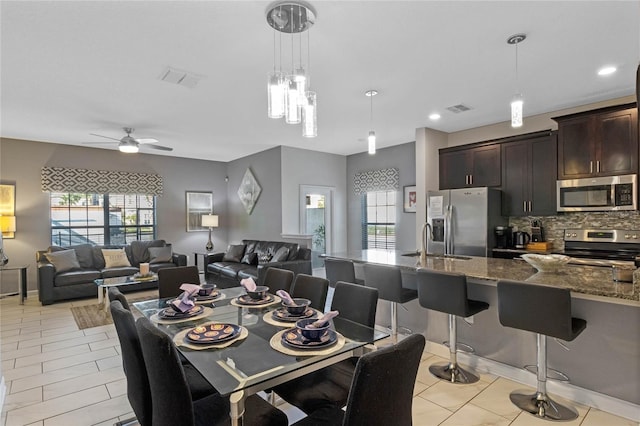 dining area with recessed lighting, visible vents, ceiling fan, and light tile patterned floors