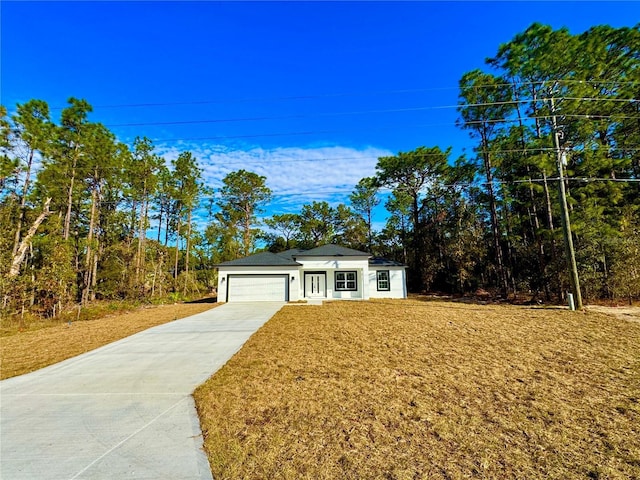 ranch-style home with a garage