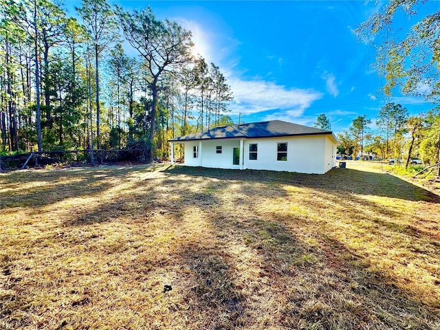 exterior space with a yard