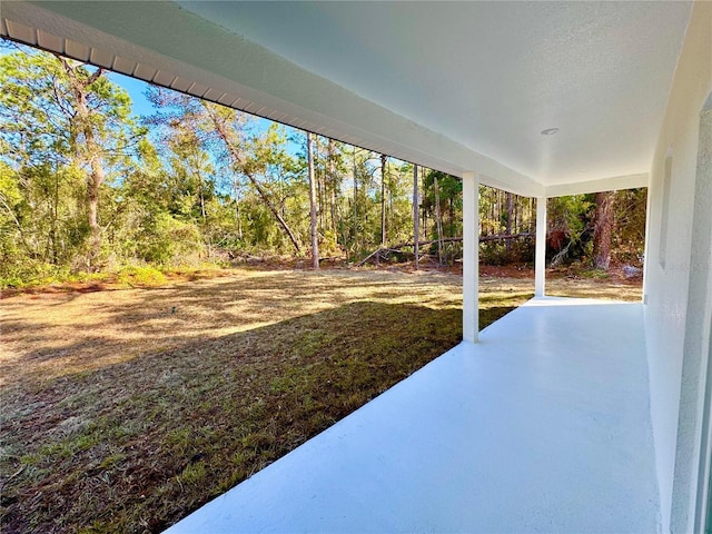 view of yard with a patio area