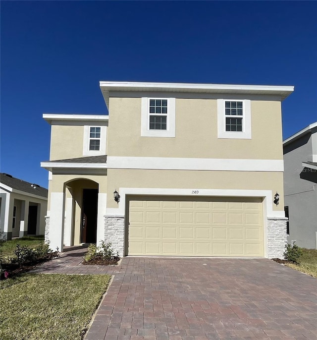 front of property featuring a garage