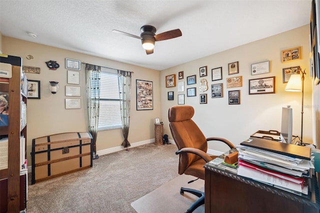 office with carpet flooring, a textured ceiling, and ceiling fan