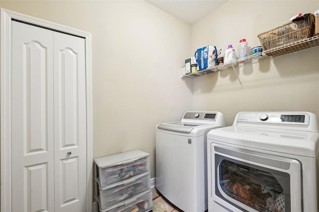 washroom featuring separate washer and dryer