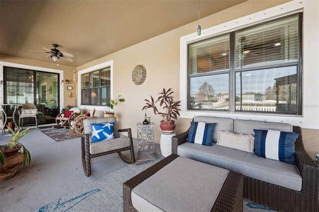 view of patio featuring ceiling fan