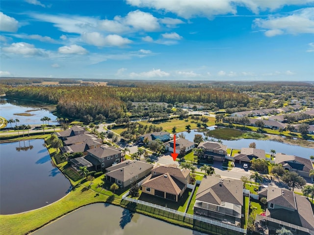 drone / aerial view featuring a water view