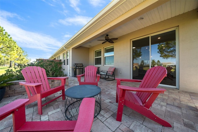 view of patio / terrace with a grill and ceiling fan