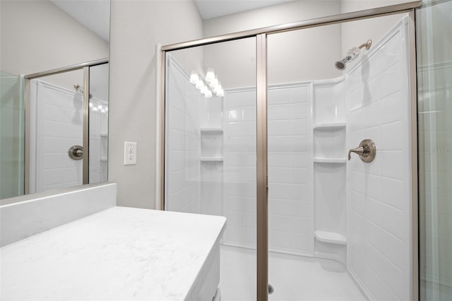 bathroom with a shower with shower door