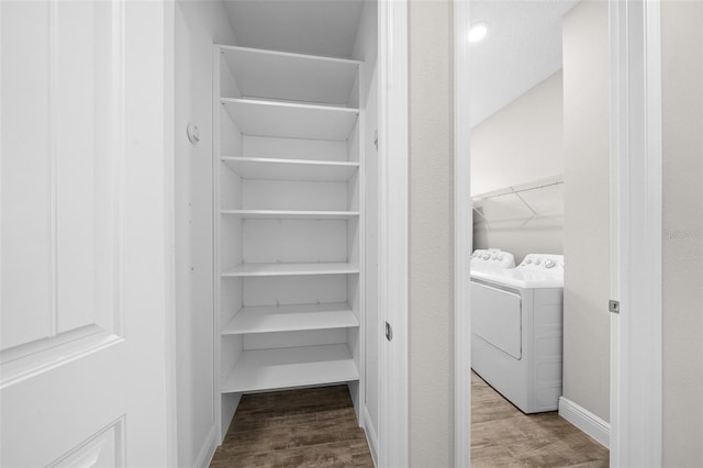 closet with separate washer and dryer