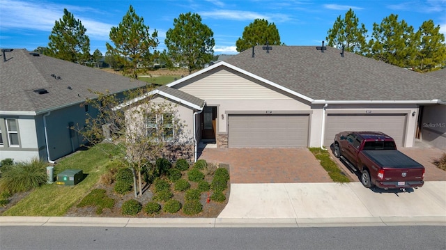 single story home with a garage