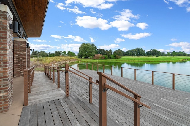 dock area with a deck with water view