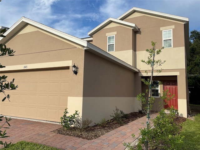 view of front of home featuring a garage