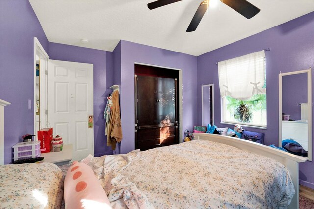 bedroom featuring ceiling fan