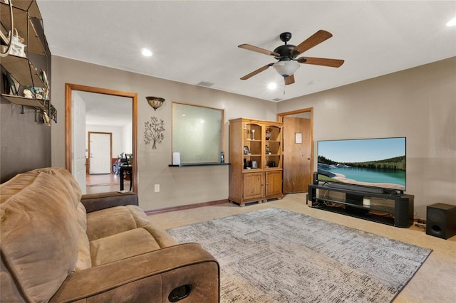 living room featuring ceiling fan