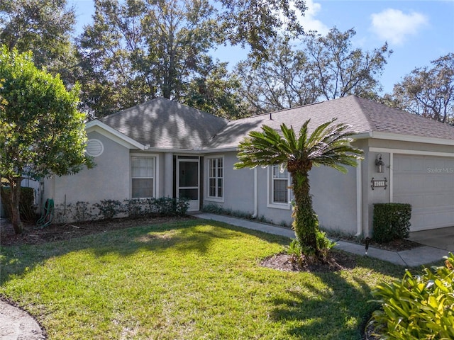 ranch-style house with a garage and a front lawn