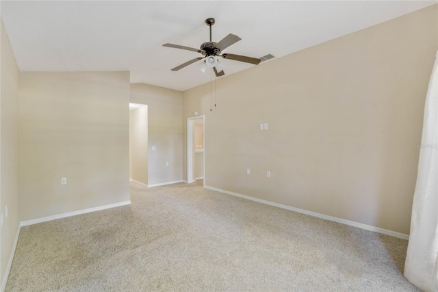 empty room featuring light carpet and ceiling fan