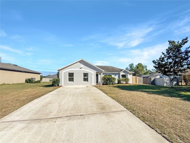 single story home with a front lawn