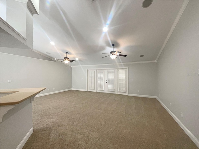 unfurnished living room featuring carpet and ornamental molding